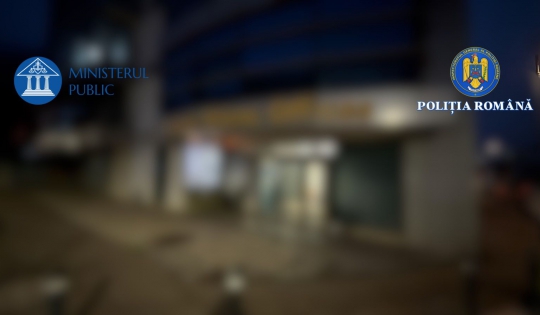 Verificări efectuate de polițiștii specializați în investigarea criminalității economice într-un caz de fraudă și de spălare de bani